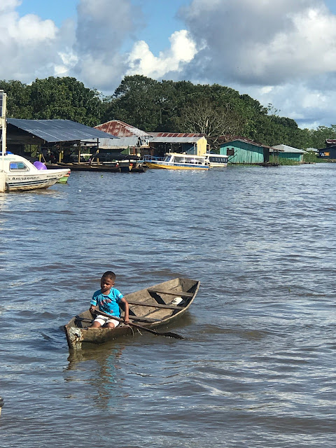 THE LITTLE BOATMAN OF THE AMAZON